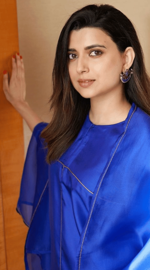 Nimrat Khaira in blue suit