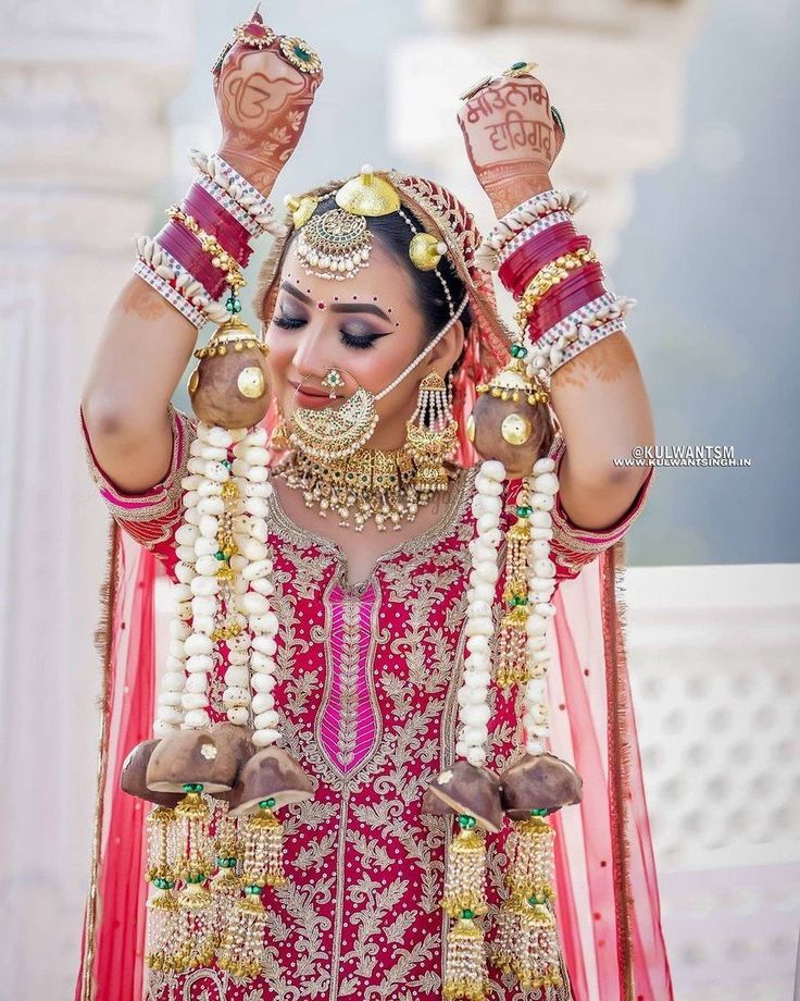 Punjabi bride wearing bridal kaleeras during wedding ceremony