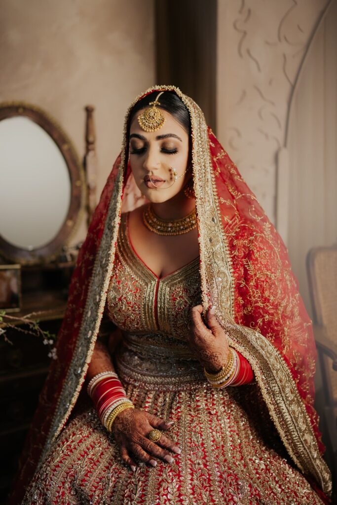 Punjabi bride in red lehenga