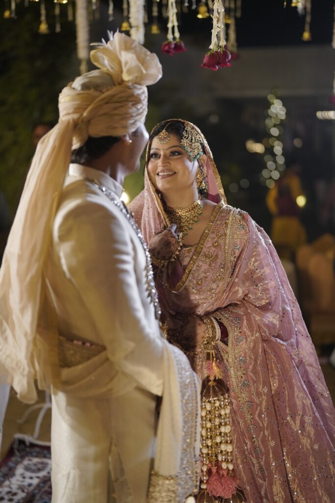Emotional moment between bride and groom during their Punjabi wedding ceremony in Mohali