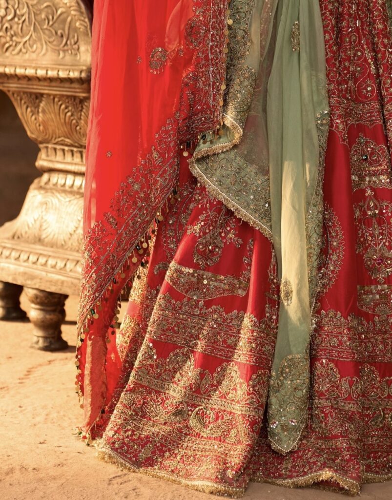 Red bridal lehenga from kORA COLLECTION BY Akriti Ritika