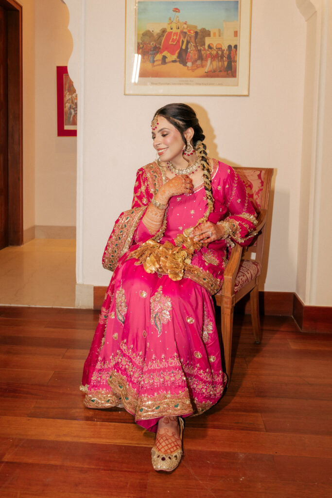 Punjabi bride in rani pink sharer on her jaago at opera sukhvilas Chandigarh