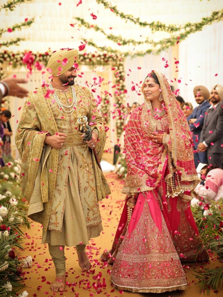 Elegant Punjabi groom wearing a traditional wedding ensemble